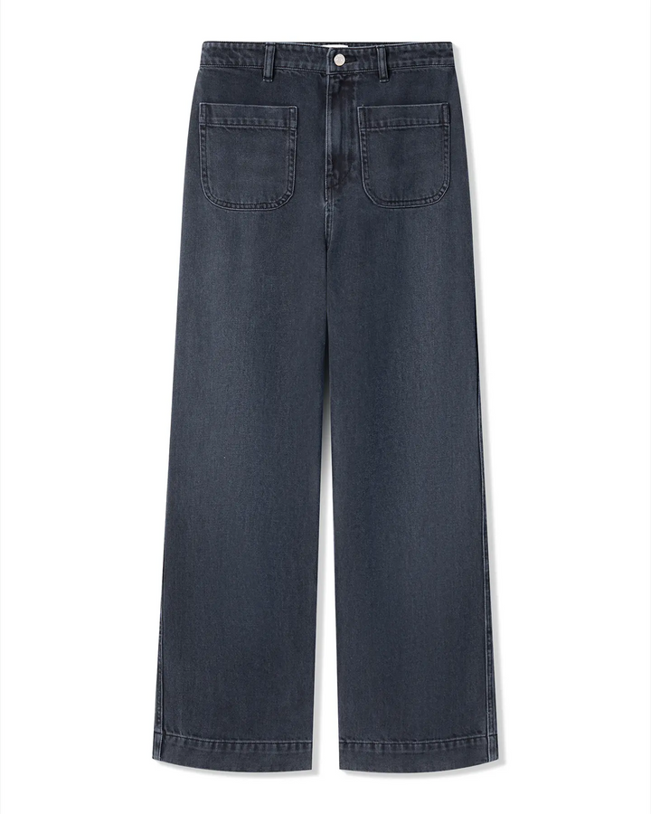 Jean femme en denim 100% coton couleur bleu foncé, coupe large et droite avec poches avant carrées, idéal pour toutes les morphologies.