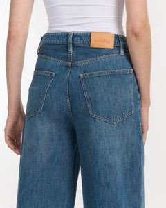 Jean femme en denim bleu moyen 100 % coton avec coupe large et taille haute, matière épaisse et résistante signée Labdip, idéal pour toutes morphologies.