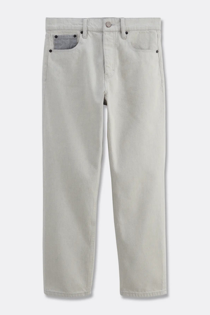 Jean droit pour femme en denim 100% coton de couleur gris clair avec poche avant contrastante gris foncé, coupe normale et matière naturelle adaptée à toutes les morphologies.