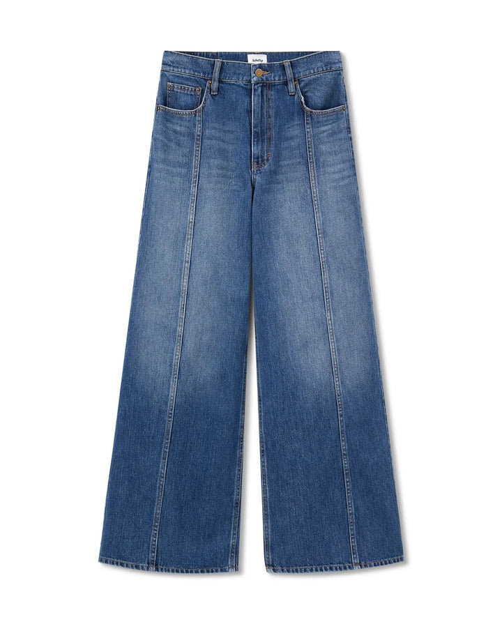 Jean large en denim bleu 100% coton, coupe droite et taille moyenne, offrant un confort idéal et une silhouette décontractée adaptée à toutes les morphologies.